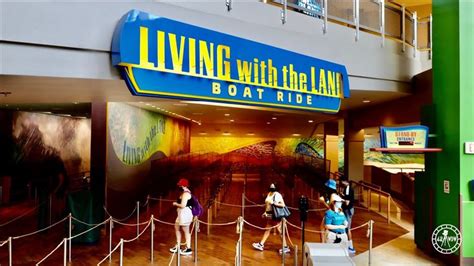 People Standing In Line At The Entrance To Living With The Land Boat Ride