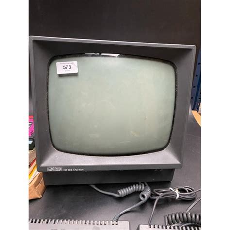 A Vintage Amstrad Cpc464 Along With Amstrad Gt64 Monitor And Accessories