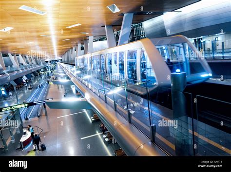 Interior Of Modern Hamad International Airport With Passenger Train In Terminal In Doha Qatar