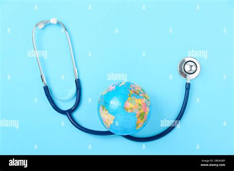 World Health Day Concept Stethoscope Globe On Blue Background With