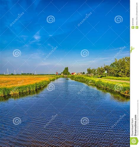 Dutch Landscape With A Canal And Grass Fields Stock Image Image Of