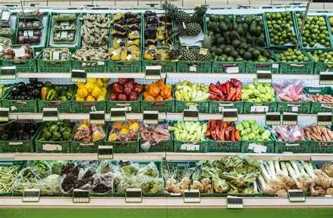 Stand With Fruits And Vegetables In The Supermarket Stock Photo