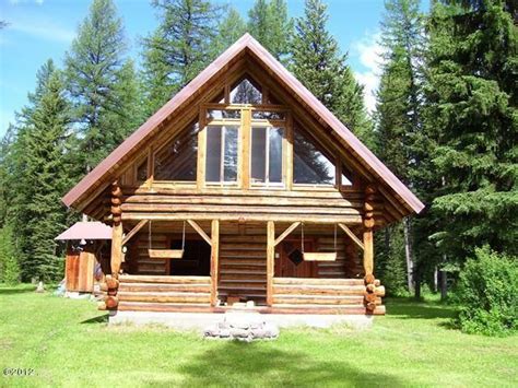 MLS 319772 | Cozy log cabin on 20 acres is bordered by forest service ...