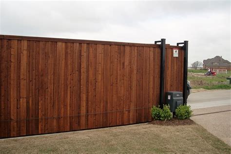 Pre Sealed Horizontal Board On Board Slide Gate With Trim Installed By Titan Fence And Supply