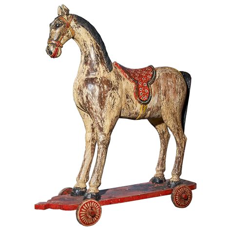 French Antique Horse Toy on Wheels with Wood Base at 1stDibs