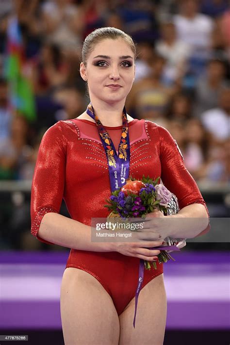 Gold Medalist Aliya Mustafina Of Russia Stands On The Podium During