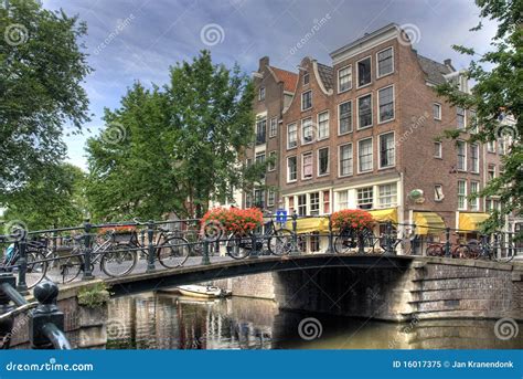 Amsterdam Bridge stock image. Image of houses, bikes - 16017375