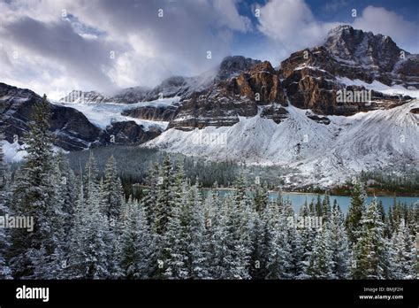 Mount Crowfoot & the Crowfoot Glacier above Bow Lake in the snow ...