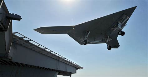 US Navy's Unmanned X47-B Jet Lands On Aircraft Carrier For The First ...