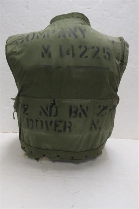 Sold Price Vietnam Era Flak Jacket Helmet Liner Dog Tags Invalid