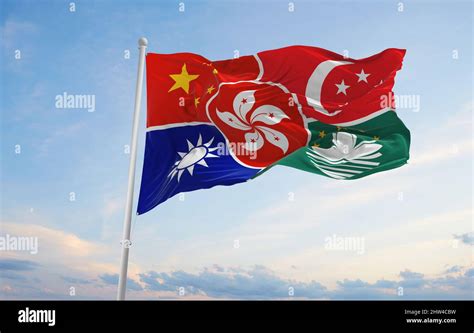 official flag of chinese speaking countries and territories at cloudy sky background on sunset ...