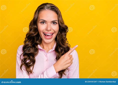 Photo Of Astonished Millennial Brunette Lady Indicate Empty Space Wear