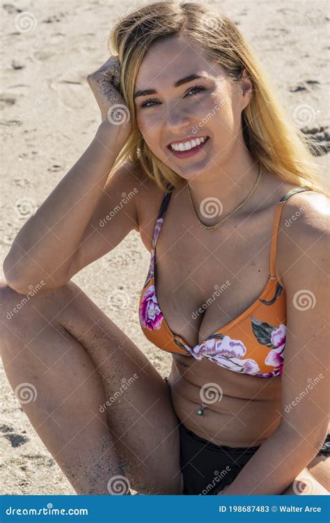 Beautiful Bikini Model Posing In A Beach Environment Stock Image