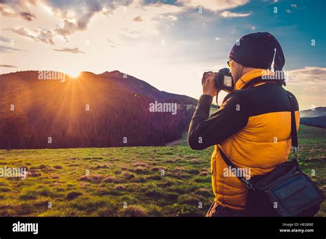 Nature Photographer Tourist In Mountains Stock Photo Alamy