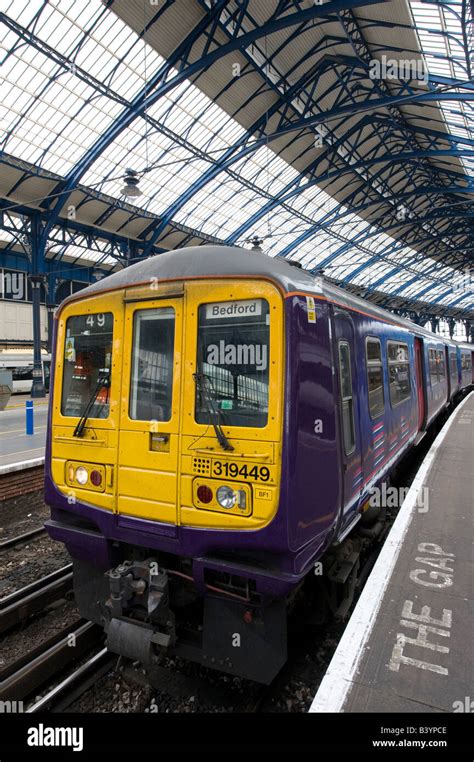 Class 319 Train In First Capital Connect Livery Waiting At A Platform