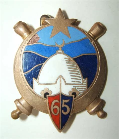 INSIGNE 65 REGIMENT D ARTILLERIE D AFRIQUE Drago Beranger ECLATS D