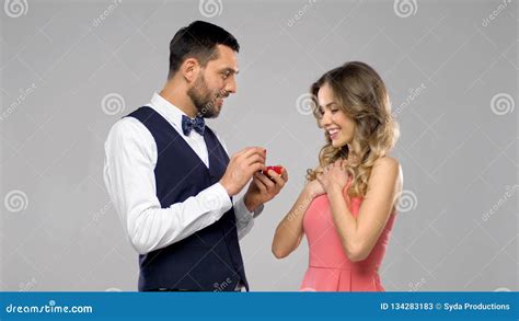 Happy Man Giving Engagement Ring To Woman Stock Image Image Of Beard