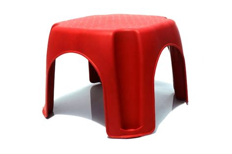 premium photo red stool  white background