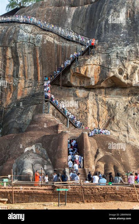 A stream of people climb the stairway from the Lion Platform towards ...