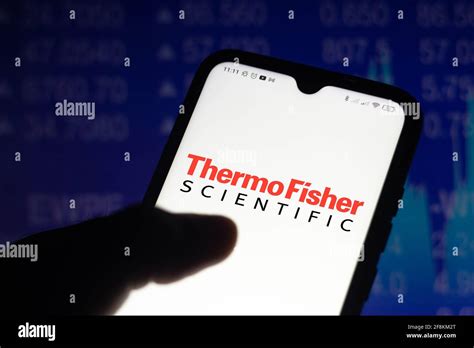 In this photo illustration, the Thermo Fisher Scientific logo seen ...