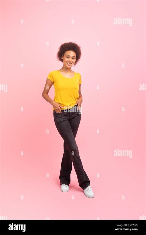 Happy Pretty Millennial African American Curly Lady Student In Casual