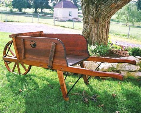 The 25 Best Wooden Wheelbarrow Ideas On Pinterest Wheelbarrow Decor