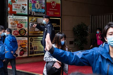 Hong Kong Police Raid A News Outlets Office After Arresting Six For