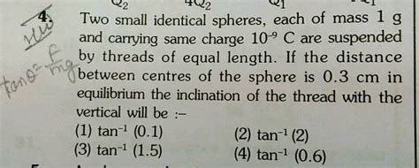 N 2 482 Two Small Identical Spheres Each Of Mass 1 G And Carrying Same