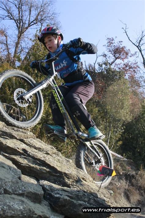 A Person Riding A Bike On A Rocky Trail