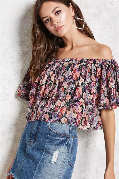 A Semi Sheer Woven Crop Top Featuring An Allover Floral Print