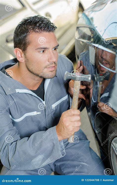 Mechanic Using A Hammer Stock Photo Image Of Grunge 122044708