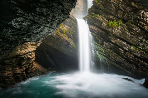 People Are Visiting This Nigerian Cave And Waterfall For Its 'Healing Powers' - Travel Noire