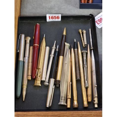 Lot-Art | A collection of vintage pens and pencils, to include one wit...