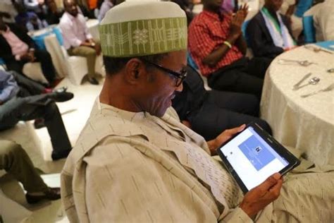 Nigerian Top Secret Photos Gen Buhari Pictured Checking Out His New Twitter Account