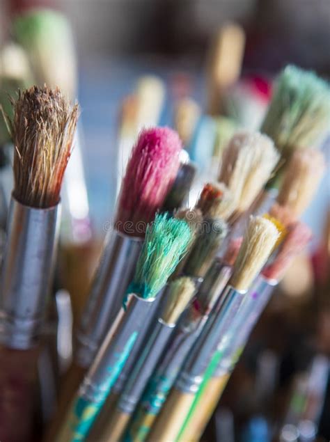 Artist Paintbrushes In An Art Studio Used To Create Works Of Art Stock