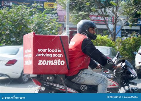 Zomato Delivery Boy with Red Hot Box for Food on a Bike Zooming at High ...