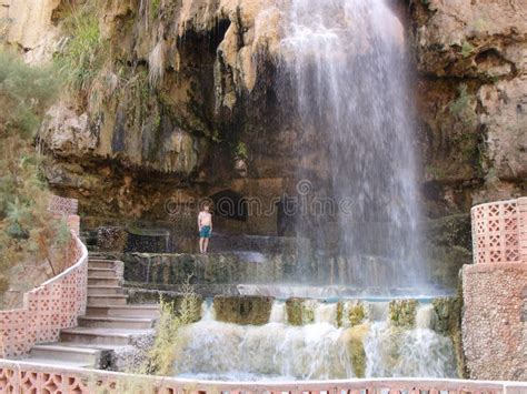 A Tourist At The Hot Spring Waterfall And Natural Pool At Hammamat Ma In Hot Springs Jordan