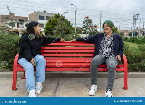 Lesbians Sitting Legs Crossed Breakfast In Bed Talking Smiling