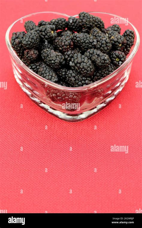 Fresh Blackberries In A Clear Glass Heart Shaped Crockery Close Up