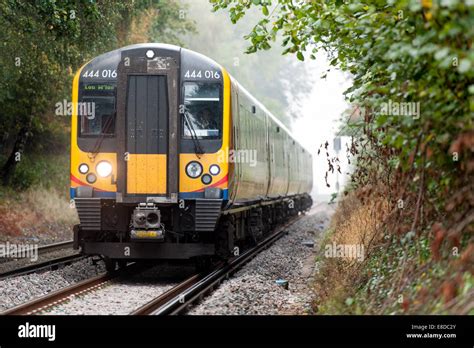 South West Trains 444 Class Electric Commuter Train On London Waterloo To Portsmouth Harbour