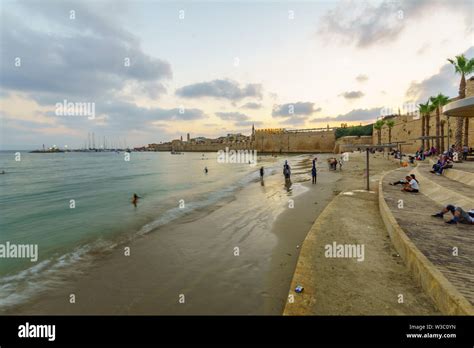 Acre, Israel - July 08, 2019: Sunset view of the Horses beach, the sea ...