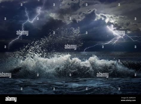 Dark night storm in ocean with lightings Stock Photo - Alamy