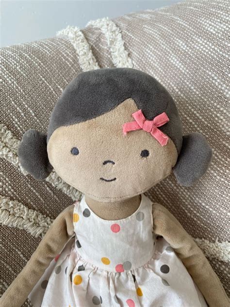 Peluche doudou obaibi poupée noir métisse marron rose et beige à pois