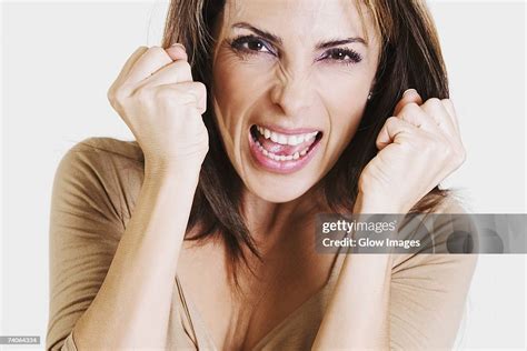 Portrait Of A Mid Adult Woman Looking Frustrated High Res Stock Photo