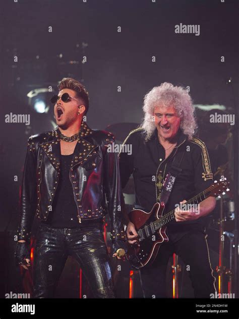 Adam Lambert Left And Brian May Of Queen Adam Lambert Perform At