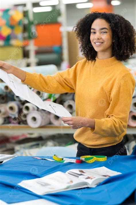 Woman In A Tailoring Studio Photo Background And Picture For Free