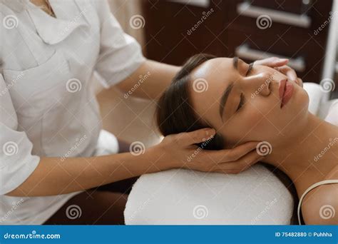 Spa Massage Beautiful Woman Getting Facial Beauty Treatment Stock