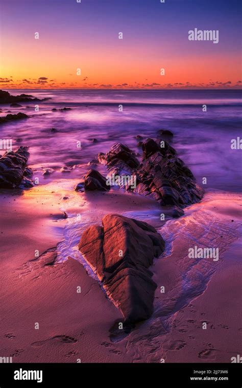 Golden Rising Sun Light On One Mile Beach In Forster Coastal Town Of Australia Pacific Ocean