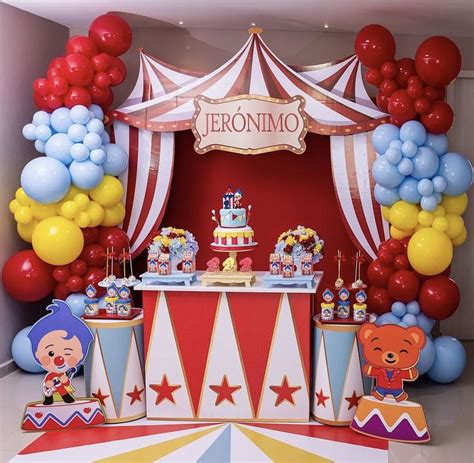 A Circus Themed Birthday Party With Balloons And Decorations