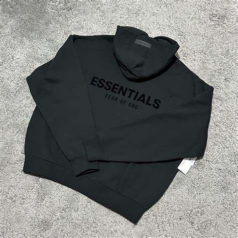 fear  god fear  god essentials black hoodie grailed